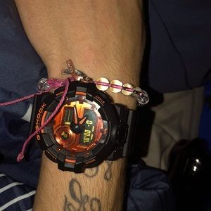 G shock orange and black asking 100$